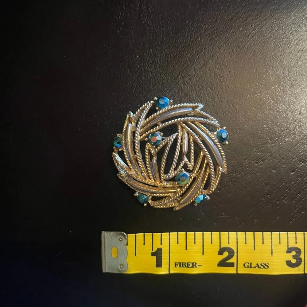 Vintage Gold tone Open Work Blue AB Rhinestone Brooch LISNER